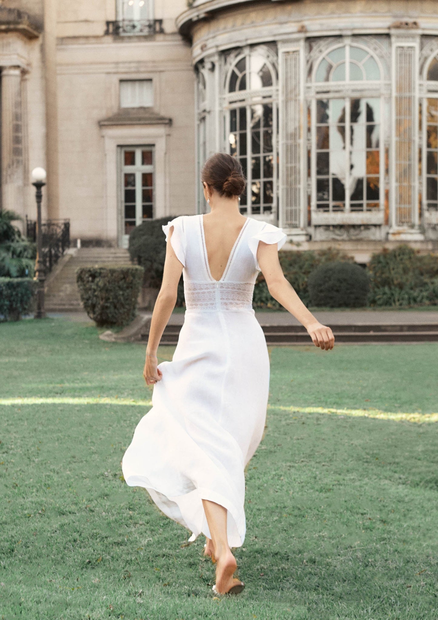 This dreamy dress is perfect for brides-to-be and summer events alike. With delicate lace inserts and trims, ruffled sleeves, and a romantic, versatile white hue, the Basel is your hero white dress.