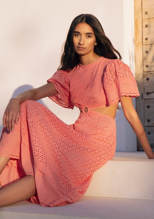 The Caro dress is back and better than ever! Our most beloved style, this stunning dress features puff sleeves, waist cut-outs, and a laced open back that will leave everyone in awe. Made in cotton eyelet, the Caro dress is sophisticated, modern, and romantic, all rolled into one. Perfect for summer events and beyond, this dress is truly a hero.